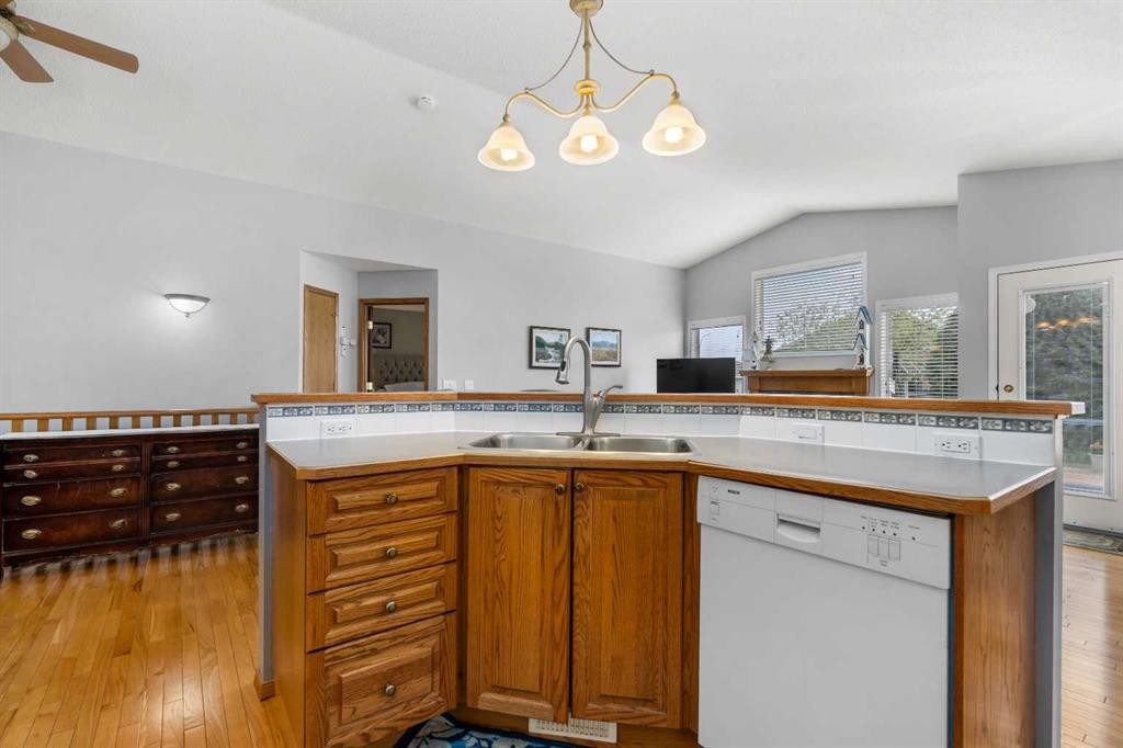 310 Riverside Garden Nw, High River, AB - Indoor Photo Showing Kitchen With Double Sink