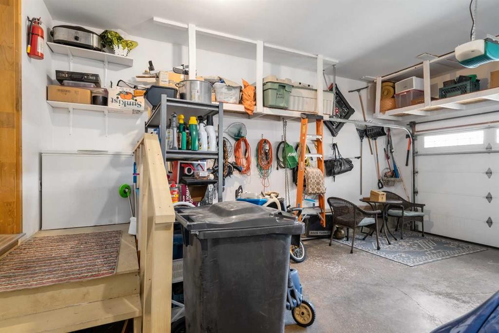 310 Riverside Garden Nw, High River, AB - Indoor Photo Showing Garage