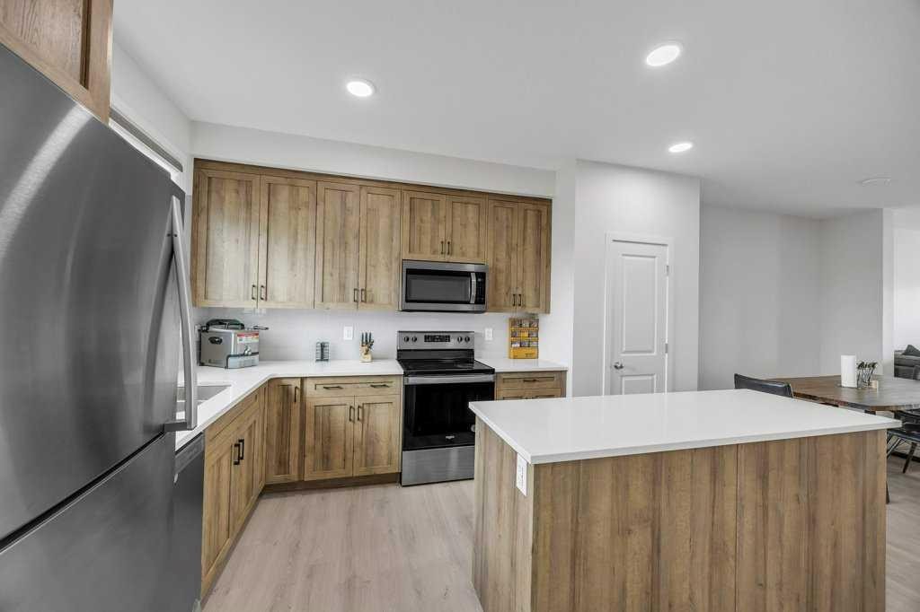 1612 Rangeview Drive Se, Calgary, AB - Indoor Photo Showing Kitchen With Stainless Steel Kitchen