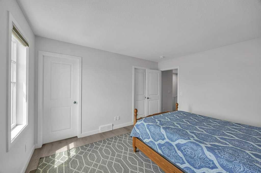 1612 Rangeview Drive Se, Calgary, AB - Indoor Photo Showing Bedroom