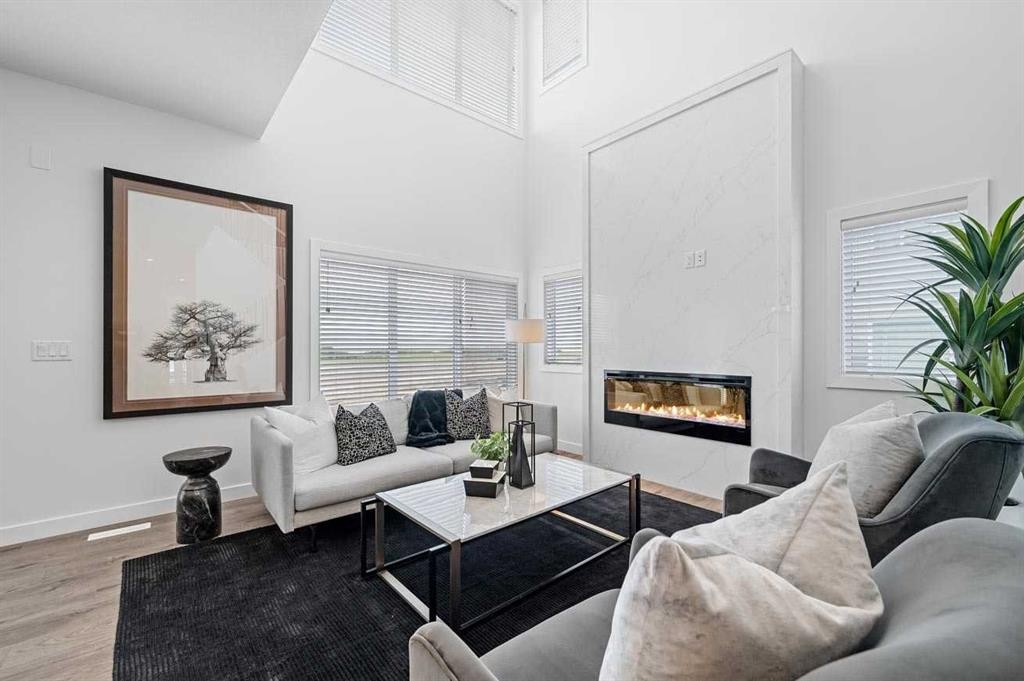 447 Dawson Terrace, Chestermere, AB - Indoor Photo Showing Living Room With Fireplace