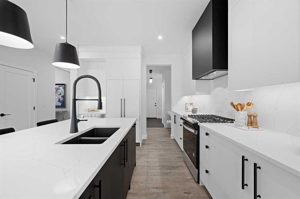 447 Dawson Terrace, Chestermere, AB - Indoor Photo Showing Kitchen With Double Sink With Upgraded Kitchen