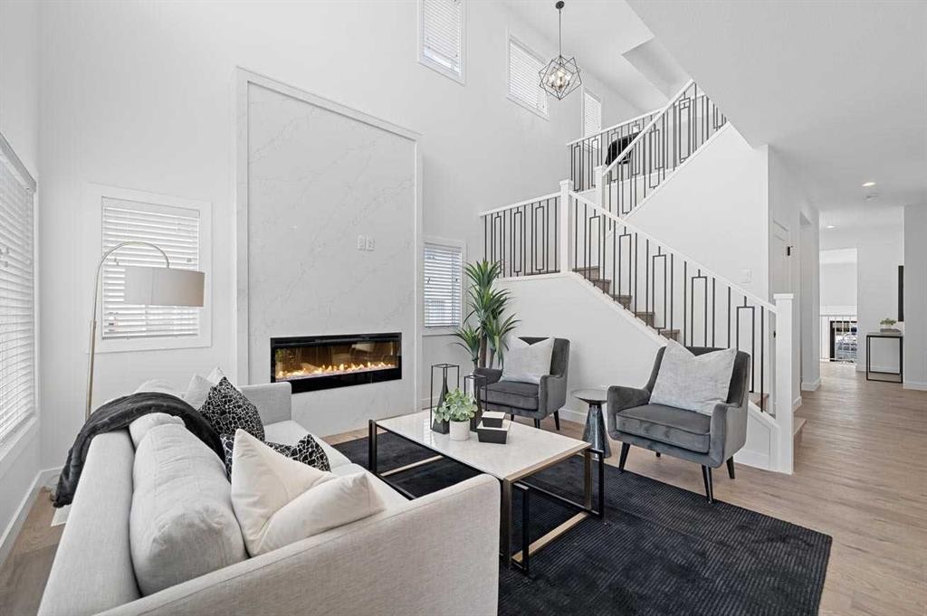 447 Dawson Terrace, Chestermere, AB - Indoor Photo Showing Living Room With Fireplace