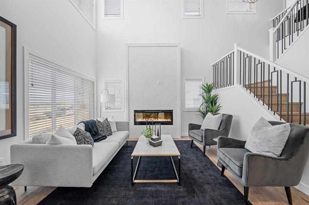 447 Dawson Terrace, Chestermere, AB - Indoor Photo Showing Living Room With Fireplace