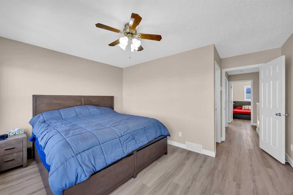 71 Eversyde Heath Sw, Calgary, AB - Indoor Photo Showing Bedroom