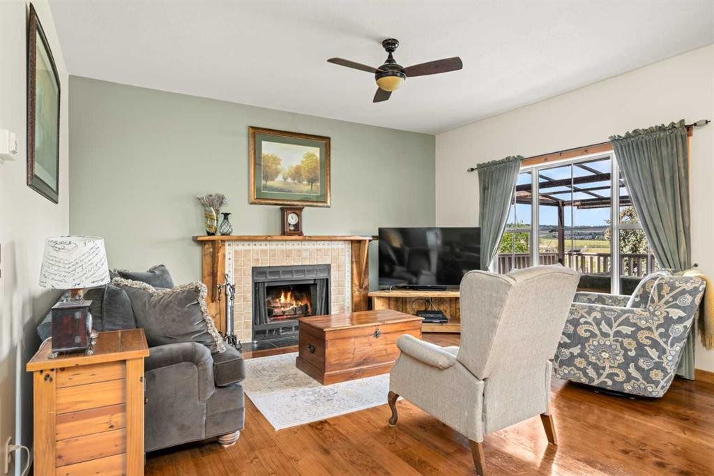 122 Hidden Creek Heights Nw, Calgary, AB - Indoor Photo Showing Living Room With Fireplace