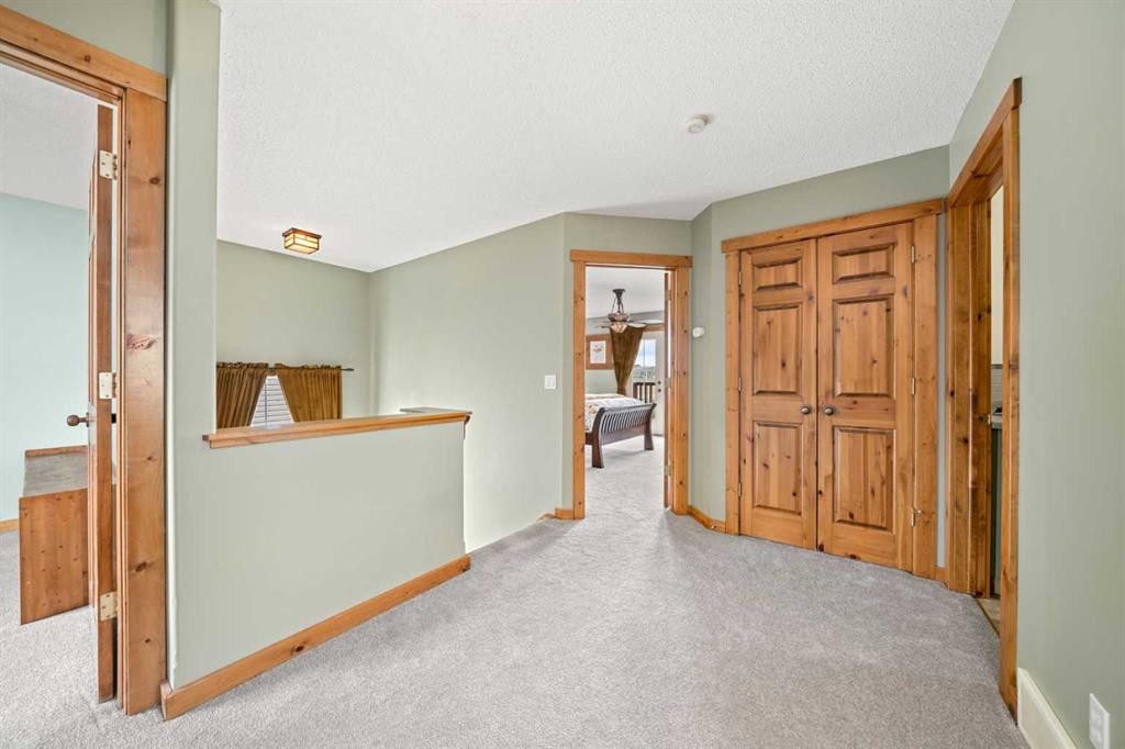 122 Hidden Creek Heights Nw, Calgary, AB - Indoor Photo Showing Other Room