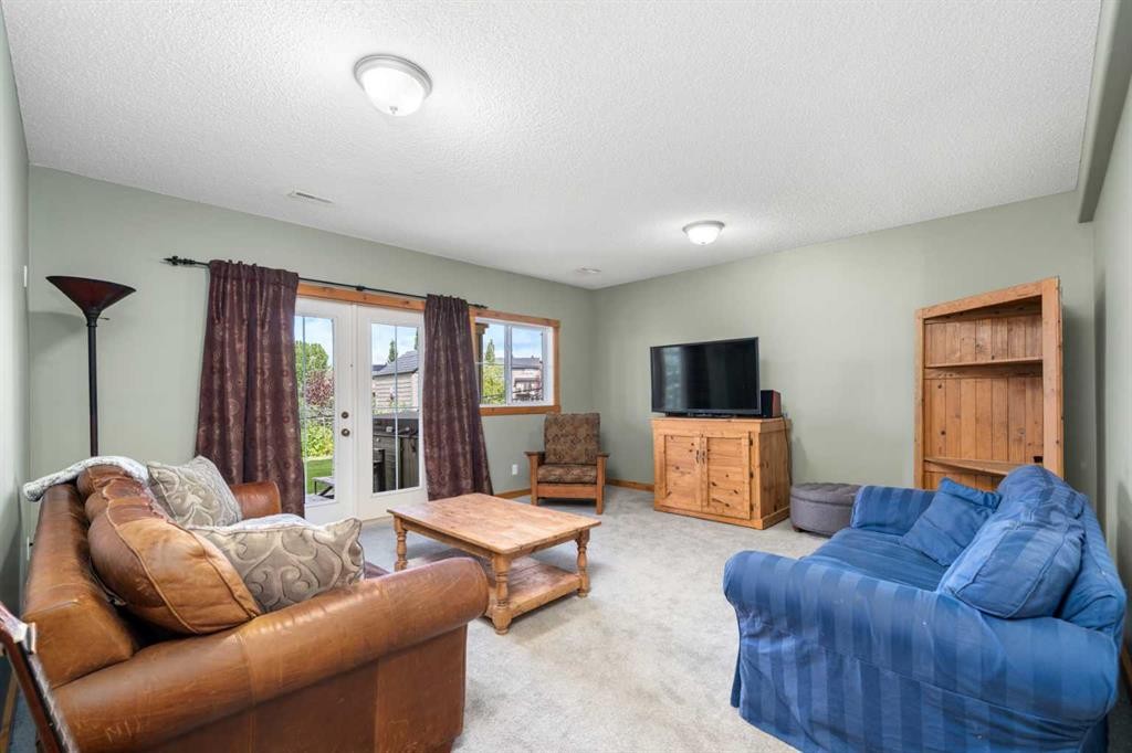 122 Hidden Creek Heights Nw, Calgary, AB - Indoor Photo Showing Living Room