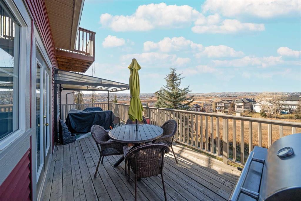 122 Hidden Creek Heights Nw, Calgary, AB - Outdoor With Deck Patio Veranda With Exterior