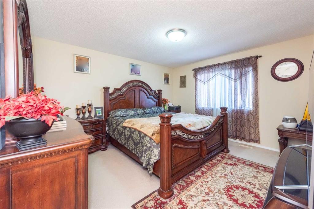 84 Tarington Way Ne, Calgary, AB - Indoor Photo Showing Bedroom