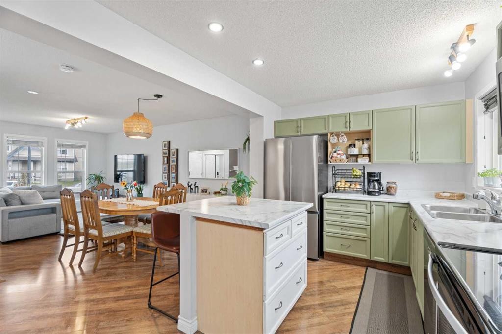 242 Elgin Place Se, Calgary, AB - Indoor Photo Showing Kitchen With Double Sink With Upgraded Kitchen