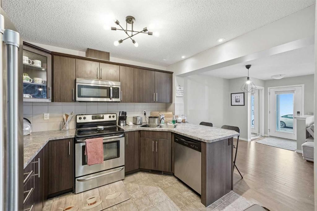 67 Cityscape Gate Ne, Calgary, AB - Indoor Photo Showing Kitchen With Double Sink