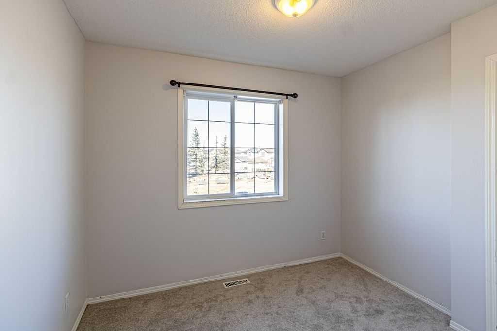 13 Coville Gardens Ne, Calgary, AB - Indoor Photo Showing Other Room