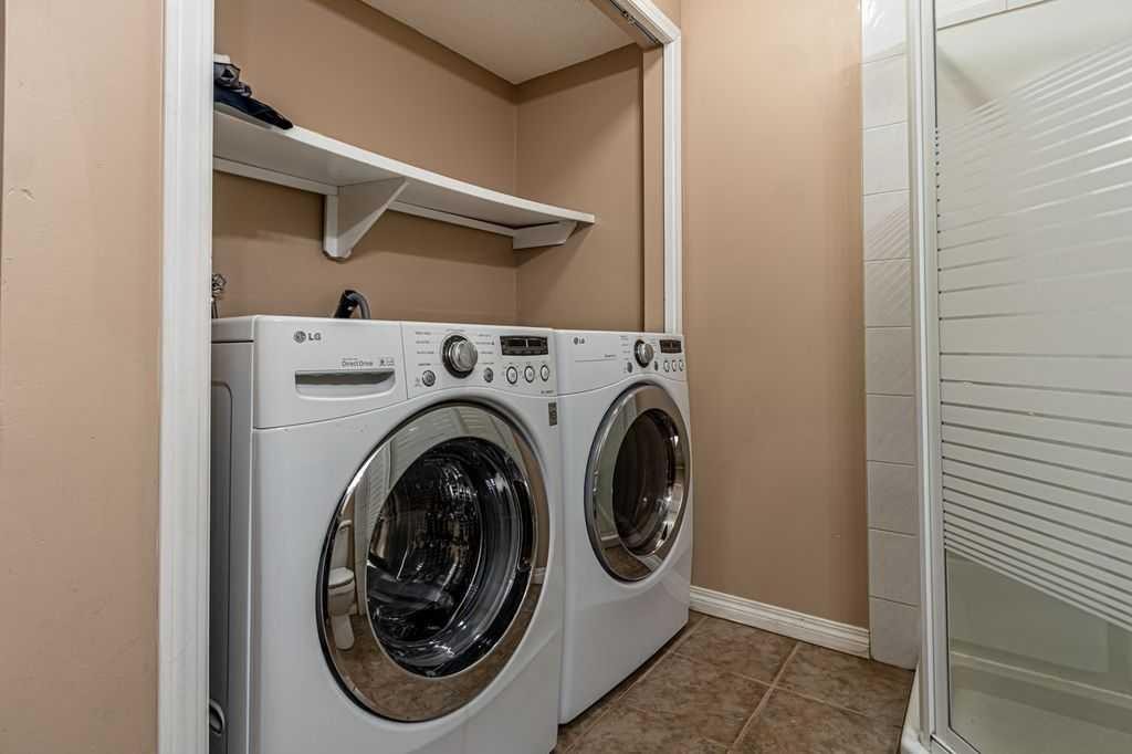 13 Coville Gardens Ne, Calgary, AB - Indoor Photo Showing Laundry Room