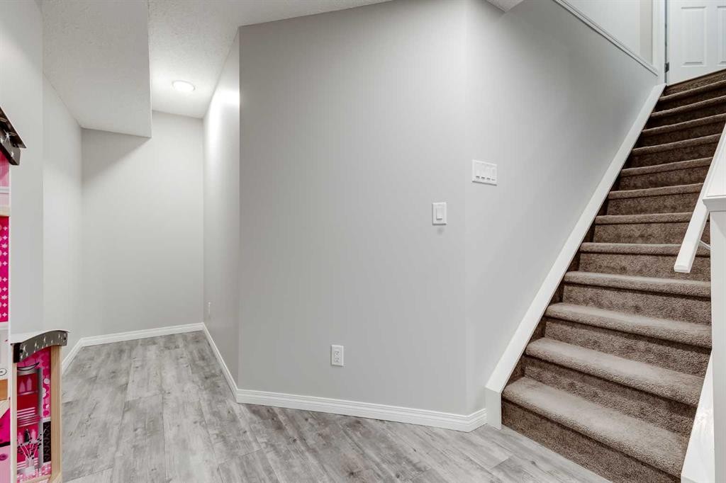 22 Osborne Common Sw, Airdrie, AB - Indoor Photo Showing Other Room