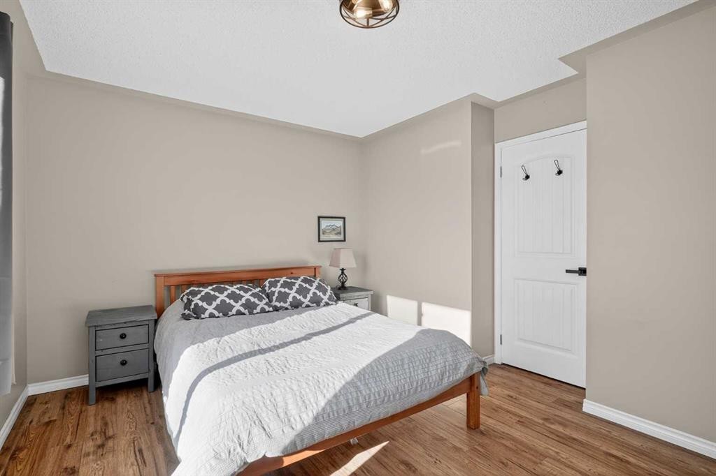 107 Mt Allan Circle Se, Calgary, AB - Indoor Photo Showing Bedroom
