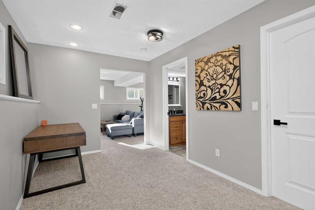 107 Mt Allan Circle Se, Calgary, AB - Indoor Photo Showing Other Room