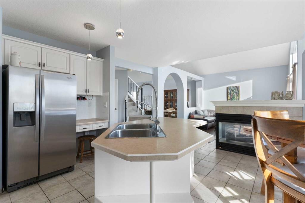 202 Schooner Close Nw, Calgary, AB - Indoor Photo Showing Kitchen With Stainless Steel Kitchen With Double Sink