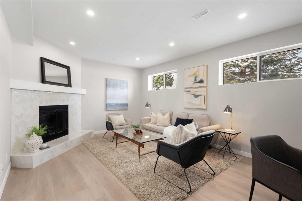 236 Silverview Way Nw, Calgary, AB - Indoor Photo Showing Living Room With Fireplace