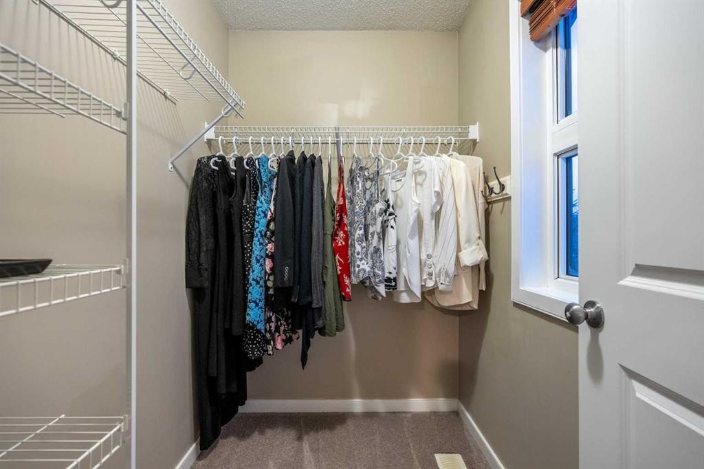 118 Walden Manor Se, Calgary, AB - Indoor With Storage