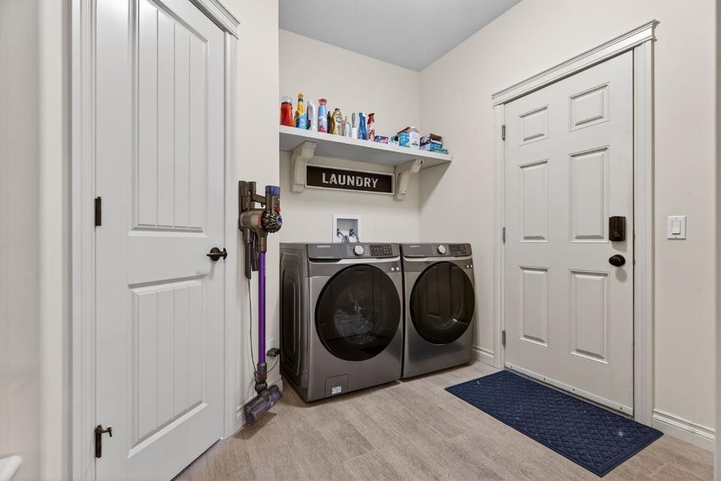 208 Cimarron Drive, Okotoks, AB - Indoor Photo Showing Laundry Room