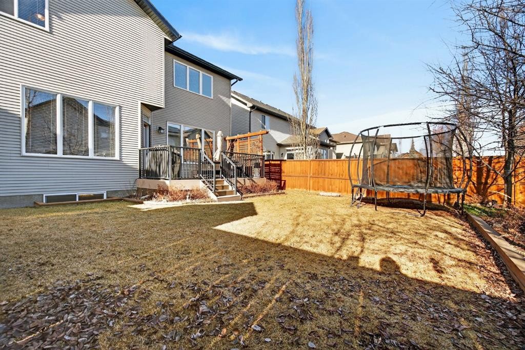 208 Cimarron Drive, Okotoks, AB - Outdoor With Deck Patio Veranda