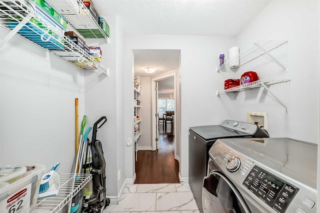 574 Chaparral Drive Se, Calgary, AB - Indoor Photo Showing Laundry Room