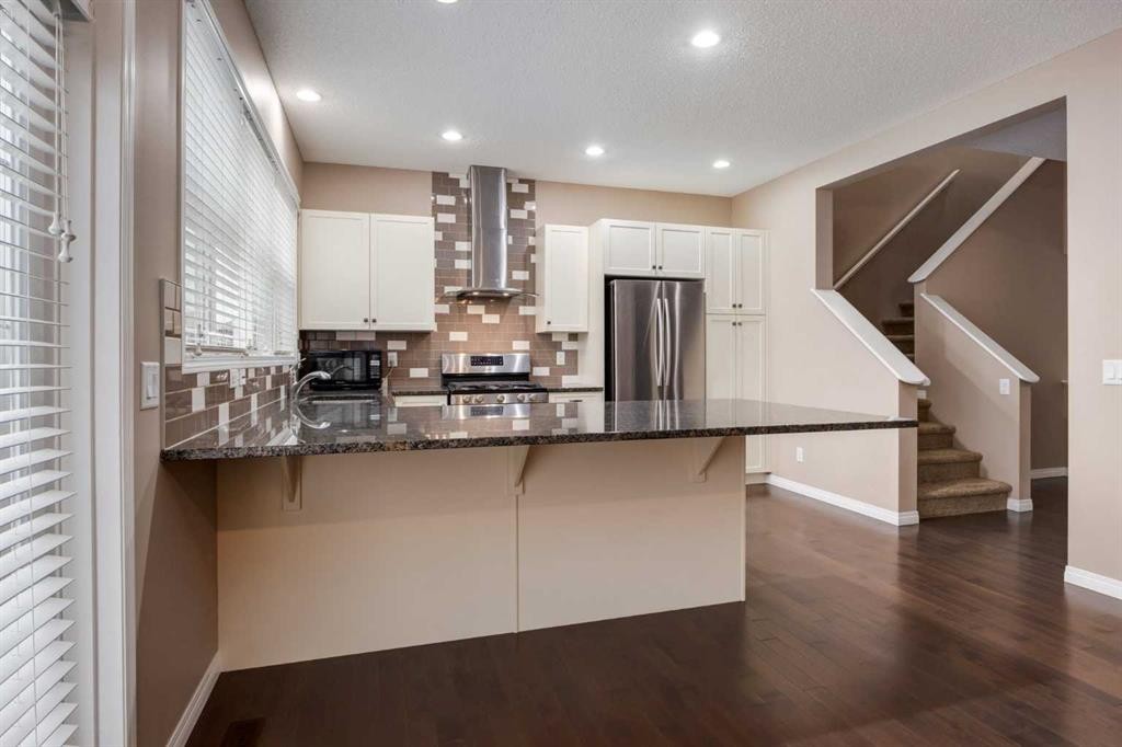 301 Auburn Meadows Boulevard Se, Calgary, AB - Indoor Photo Showing Kitchen With Upgraded Kitchen