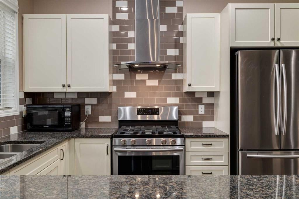 301 Auburn Meadows Boulevard Se, Calgary, AB - Indoor Photo Showing Kitchen With Stainless Steel Kitchen With Double Sink With Upgraded Kitchen