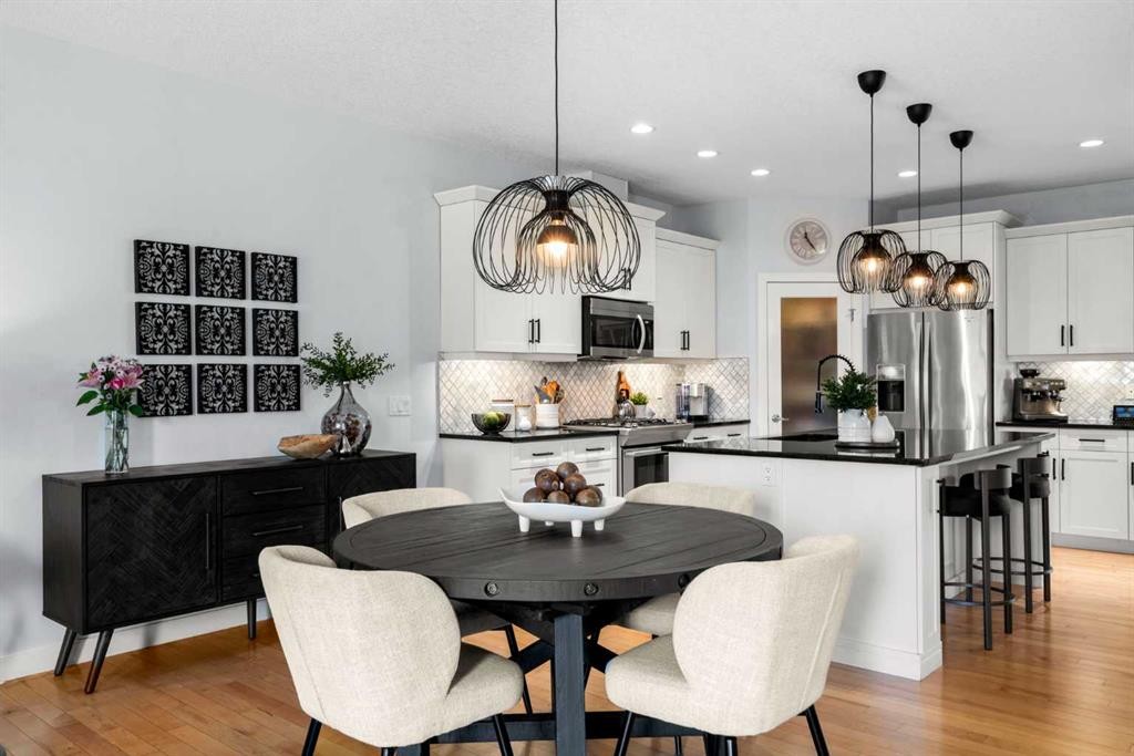 25 Fireside Landing, Cochrane, AB - Indoor Photo Showing Dining Room