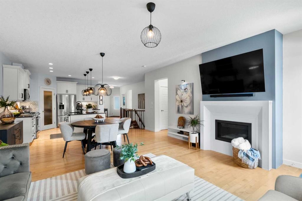 25 Fireside Landing, Cochrane, AB - Indoor Photo Showing Living Room With Fireplace