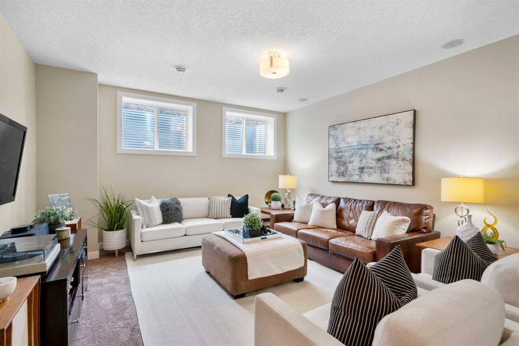 25 Fireside Landing, Cochrane, AB - Indoor Photo Showing Living Room