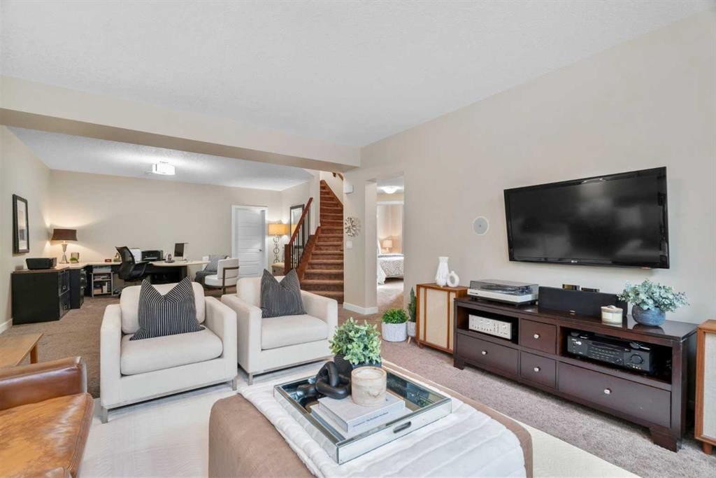 25 Fireside Landing, Cochrane, AB - Indoor Photo Showing Living Room