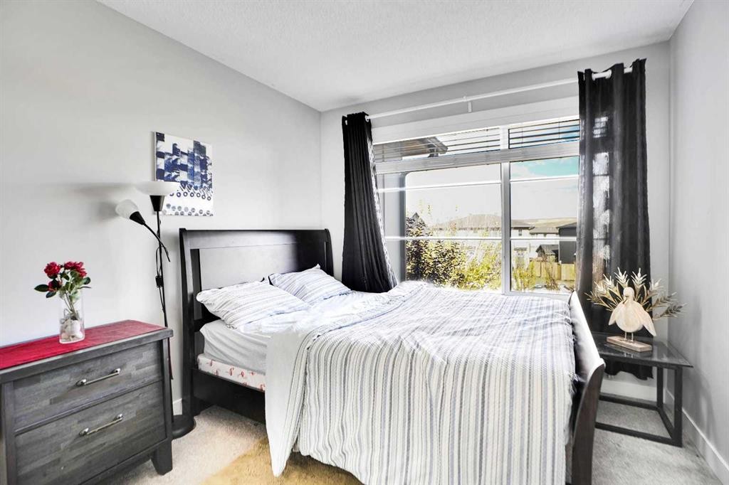 1322 Walden Drive Se, Calgary, AB - Indoor Photo Showing Bedroom