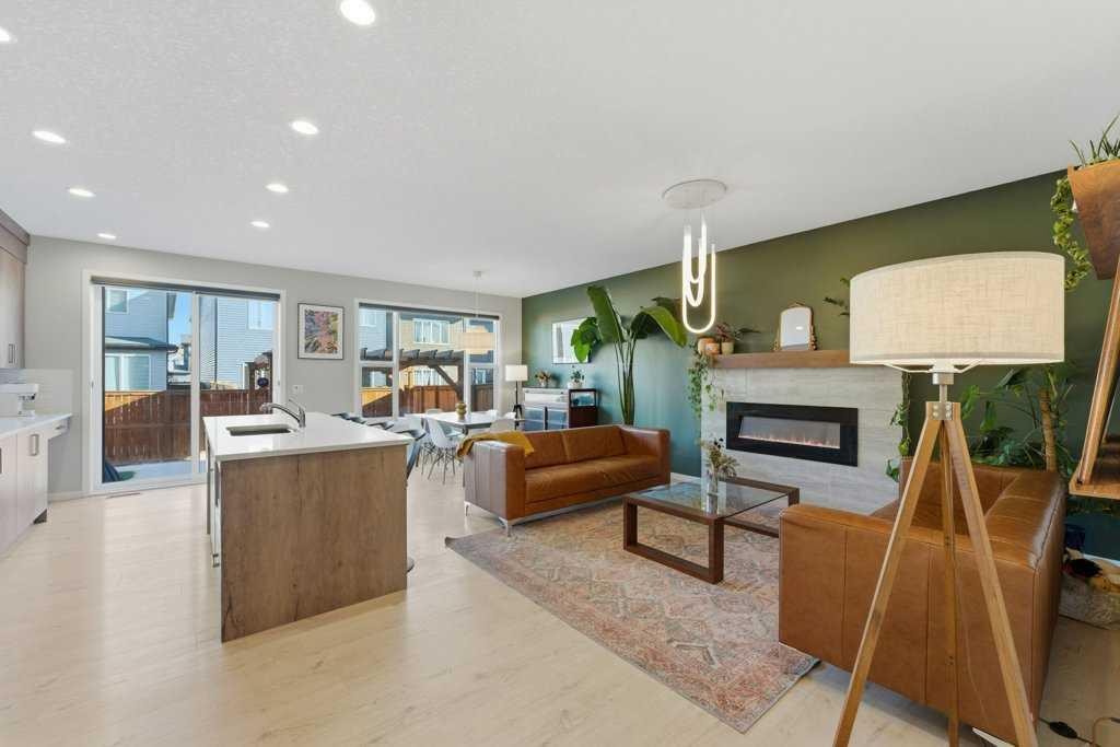 34 Walgrove Link Se, Calgary, AB - Indoor Photo Showing Living Room With Fireplace