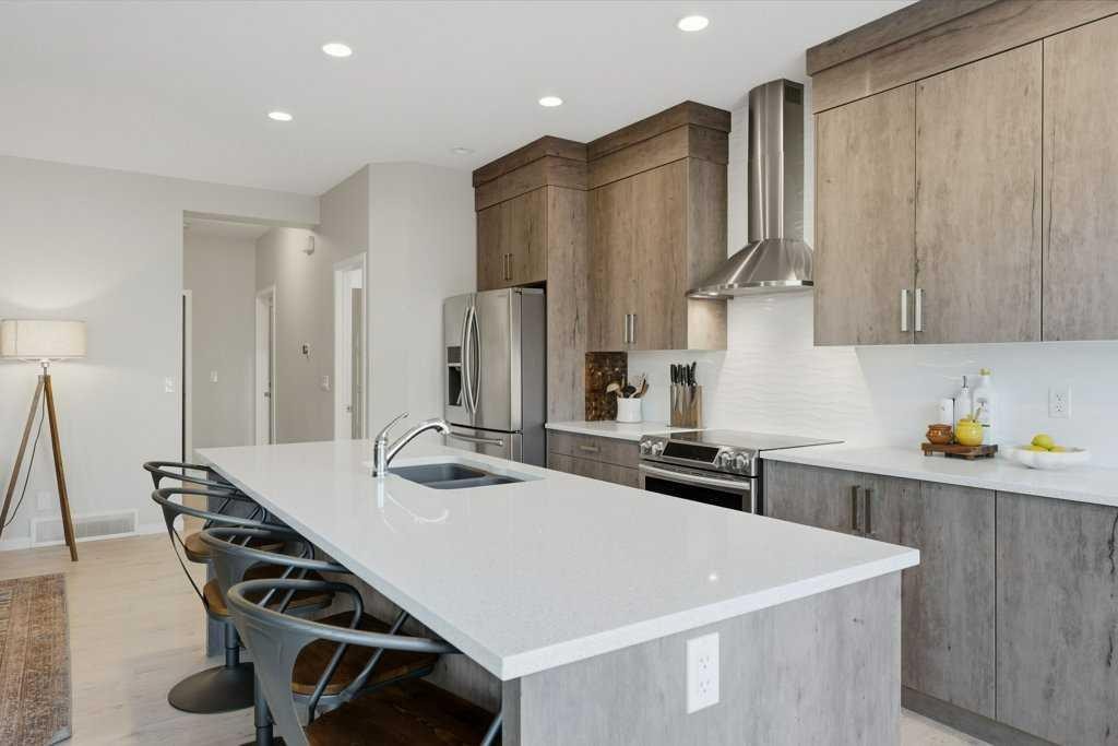 34 Walgrove Link Se, Calgary, AB - Indoor Photo Showing Kitchen With Stainless Steel Kitchen With Double Sink With Upgraded Kitchen