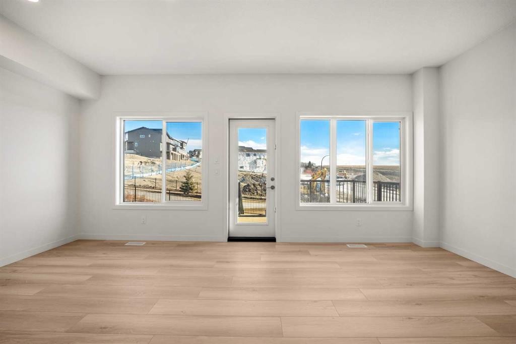 31 Heritage Heath, Cochrane, AB - Indoor Photo Showing Other Room