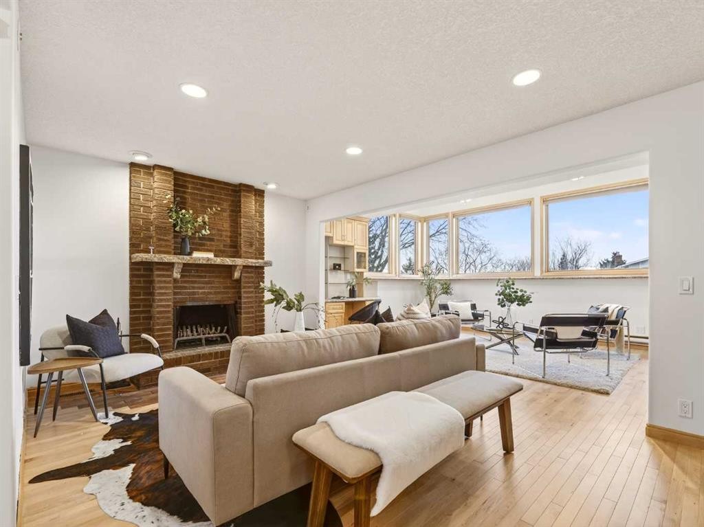 511 Ranch Estates Place Nw, Calgary, AB - Indoor Photo Showing Living Room With Fireplace