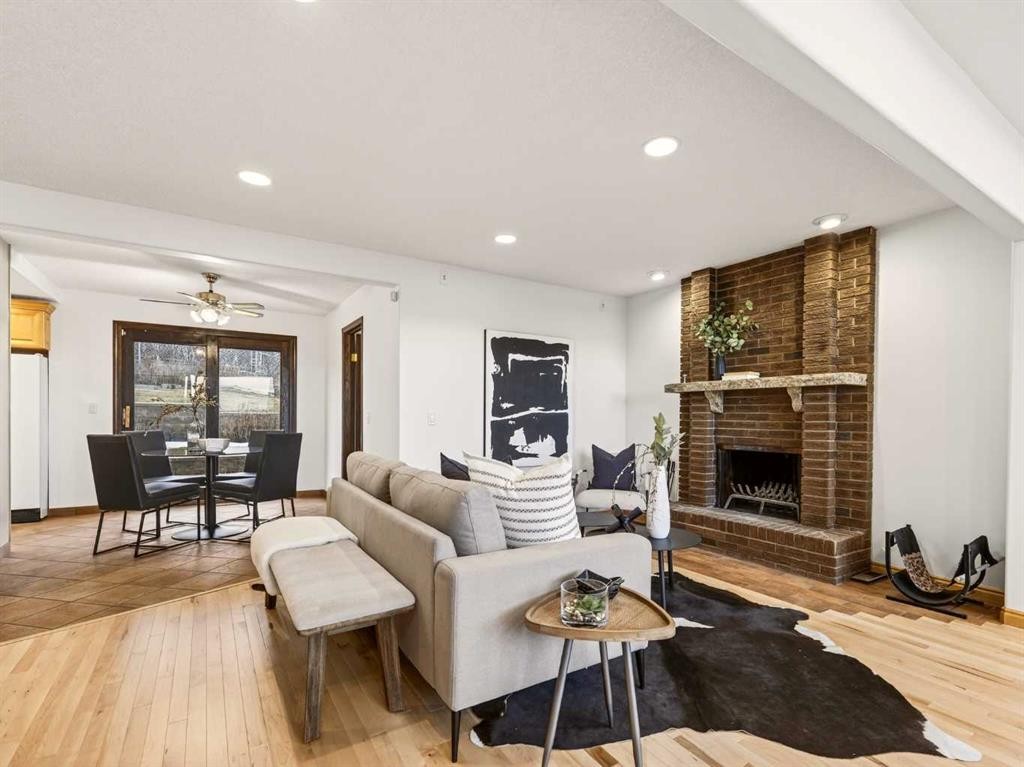 511 Ranch Estates Place Nw, Calgary, AB - Indoor Photo Showing Living Room With Fireplace