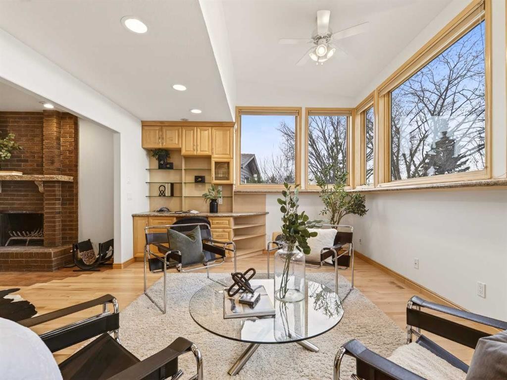 511 Ranch Estates Place Nw, Calgary, AB - Indoor Photo Showing Other Room With Fireplace