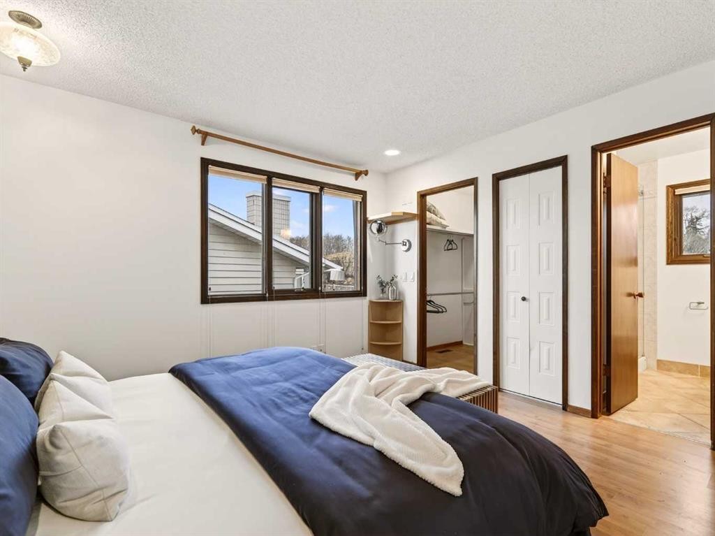 511 Ranch Estates Place Nw, Calgary, AB - Indoor Photo Showing Bedroom