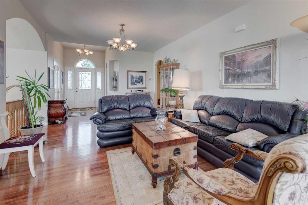 49 Arbour Crest Heights Nw, Calgary, AB - Indoor Photo Showing Living Room