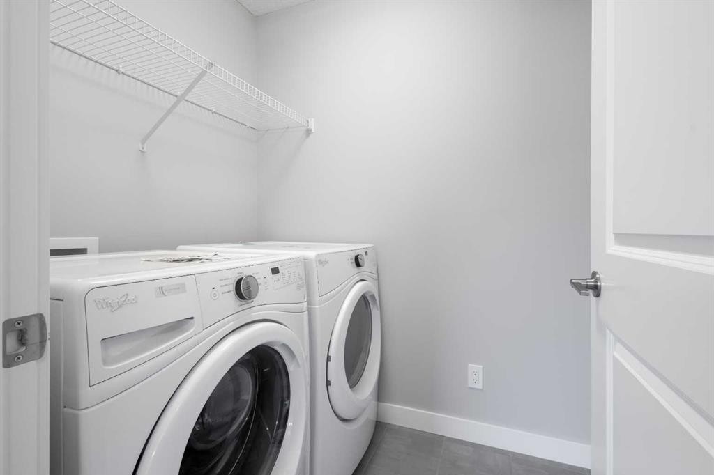13 Howse Row Ne, Calgary, AB - Indoor Photo Showing Laundry Room