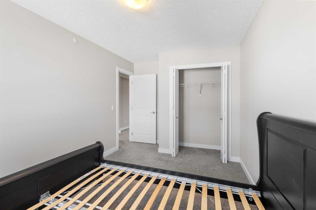 13 Howse Row Ne, Calgary, AB - Indoor Photo Showing Bedroom