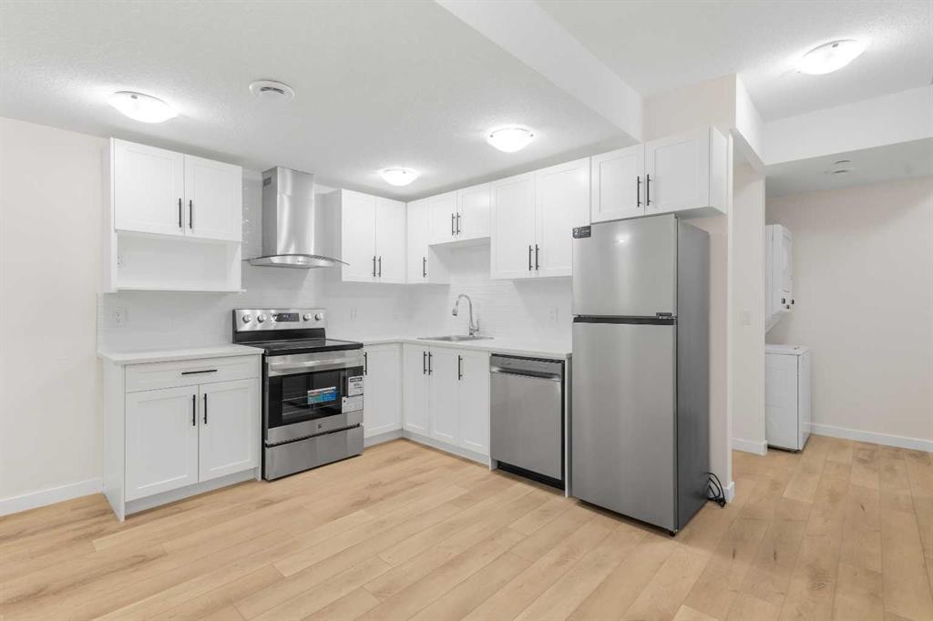 13 Howse Row Ne, Calgary, AB - Indoor Photo Showing Kitchen With Stainless Steel Kitchen