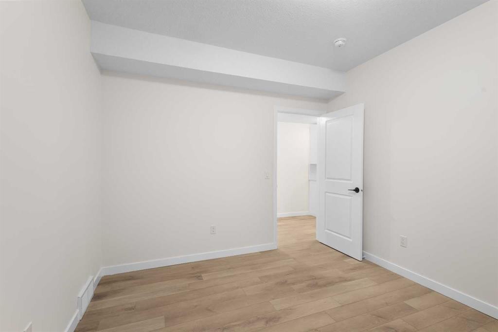 13 Howse Row Ne, Calgary, AB - Indoor Photo Showing Other Room