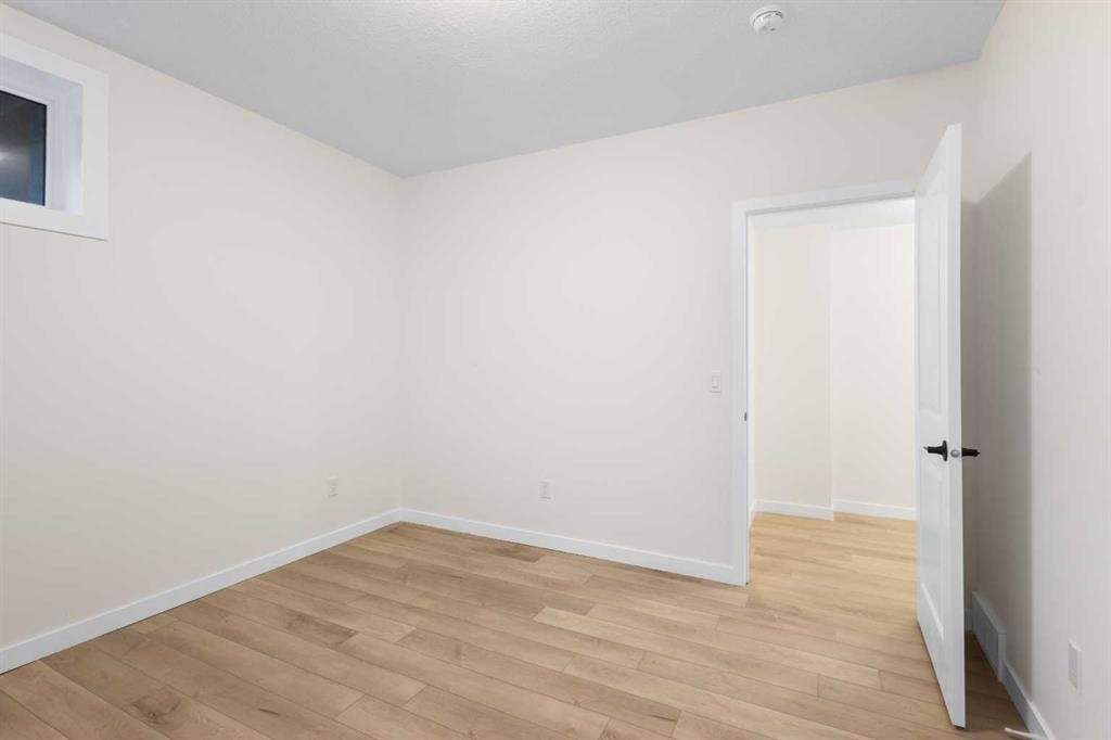 13 Howse Row Ne, Calgary, AB - Indoor Photo Showing Other Room