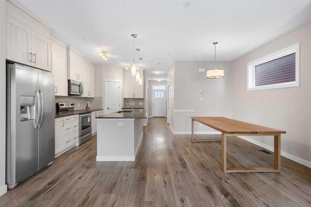 13 Howse Row Ne, Calgary, AB - Indoor Photo Showing Kitchen With Stainless Steel Kitchen With Upgraded Kitchen