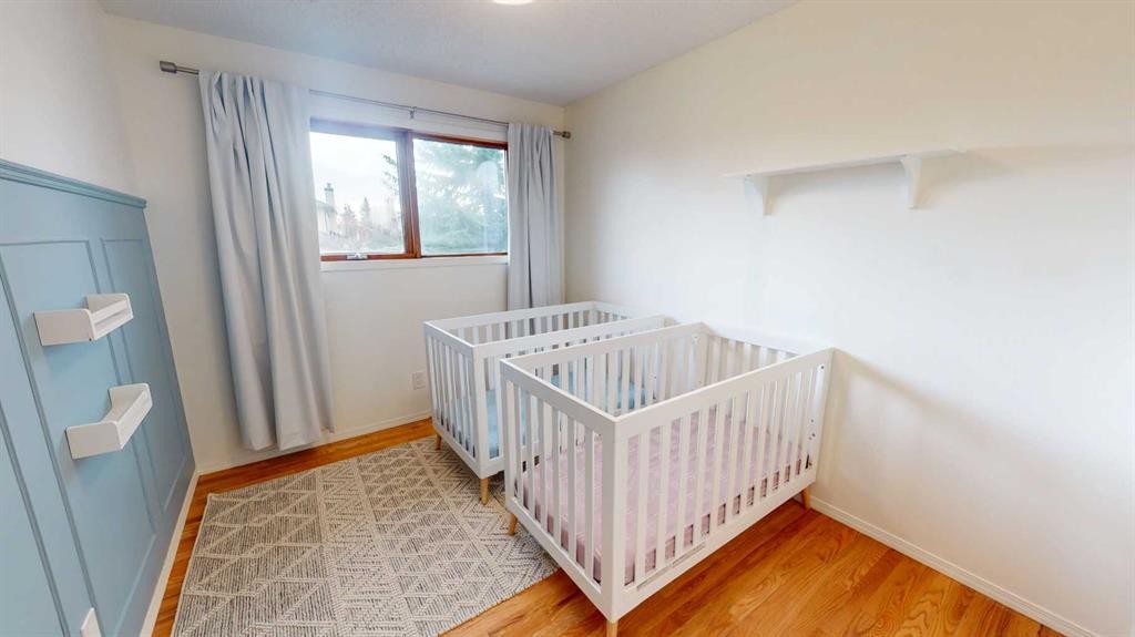 84 Sunmount Road Se, Calgary, AB - Indoor Photo Showing Bedroom