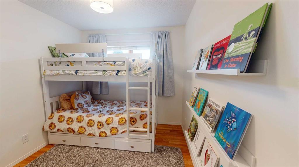 84 Sunmount Road Se, Calgary, AB - Indoor Photo Showing Bedroom